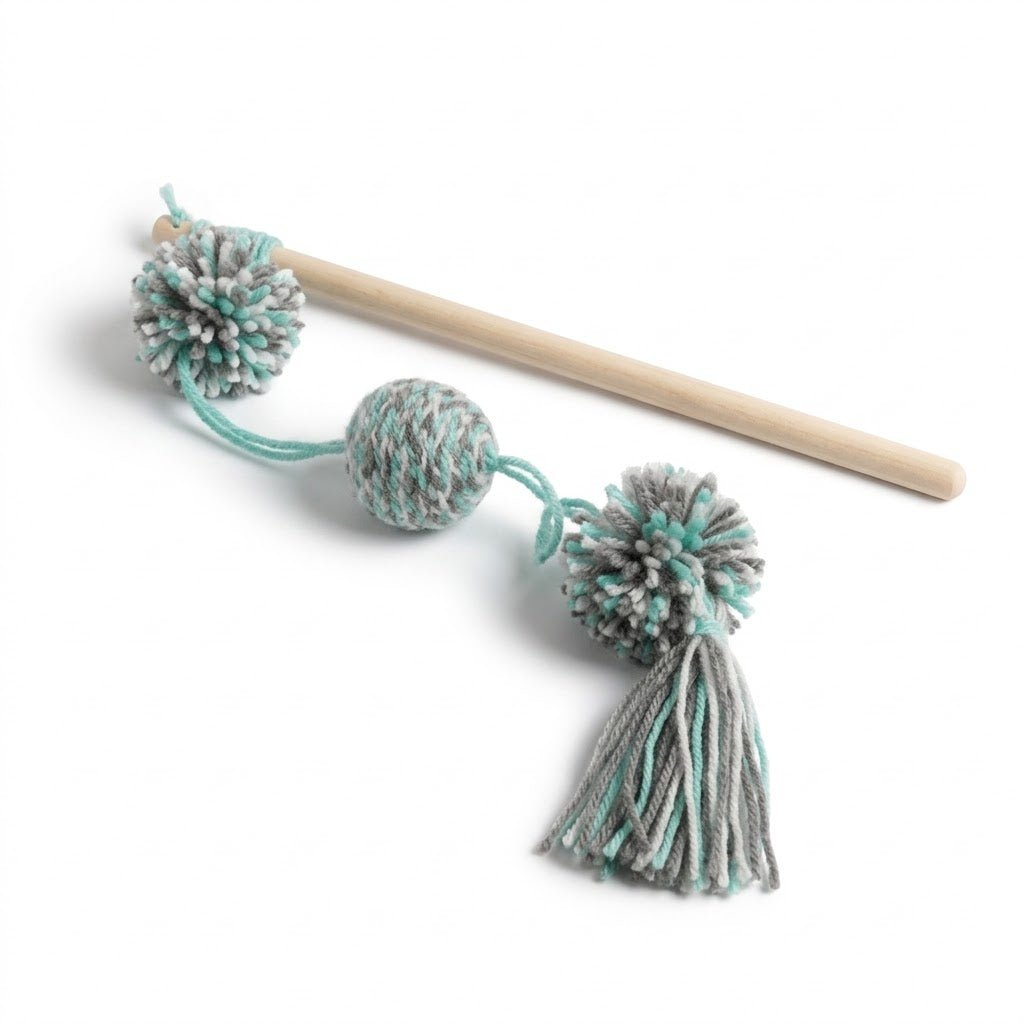 Cat wand toy with wooden handle and three yarn pom-poms plus hanging tassel
