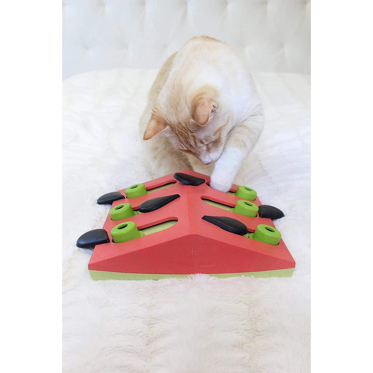 Catstages Nina Ottosson Melon Madness Puzzle & Play - cream cat using the puzzle feeder