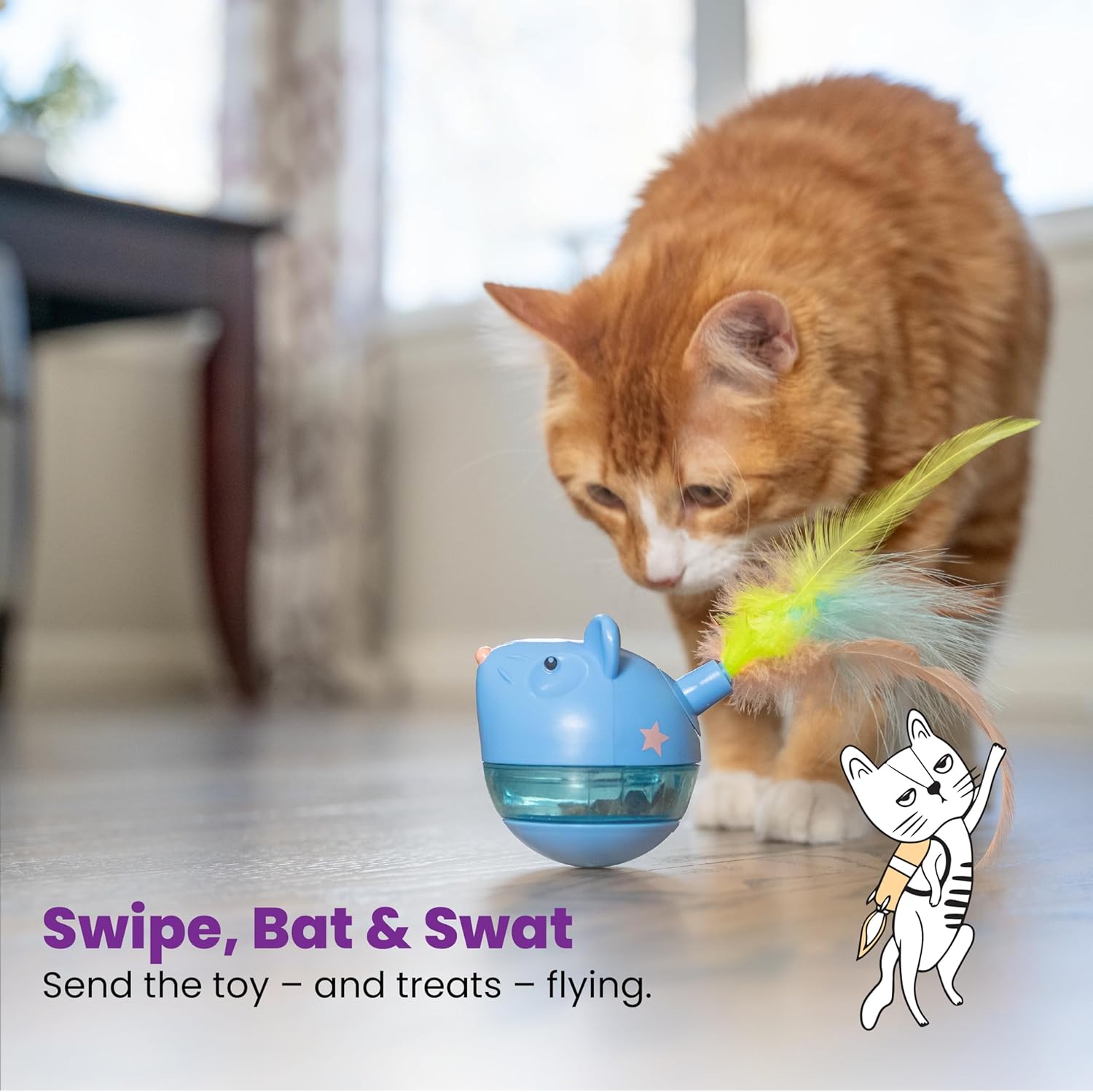 Orange cat swats a blue treat tumbler toy with bright feather wand