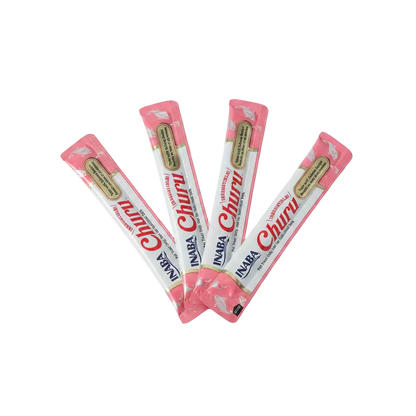 Four INABA Churu tube treats bundled together in pink packaging