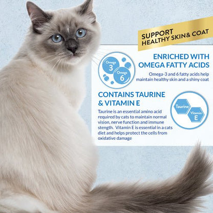 Cream-colored cat beside Churu Skin&Coat benefits label with taurine and vitamin E