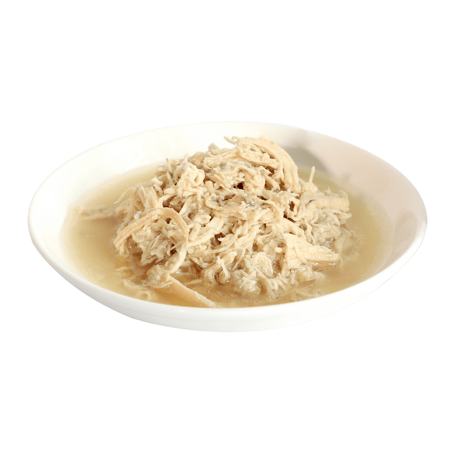 Wet cat food with shredded meat in broth served in a white oval dish