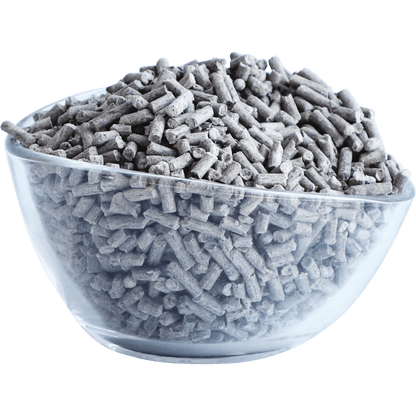 Soy clumping cat litter pellets in a light gray bowl