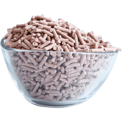 Soy clumping cat litter pellets in a beige bowl