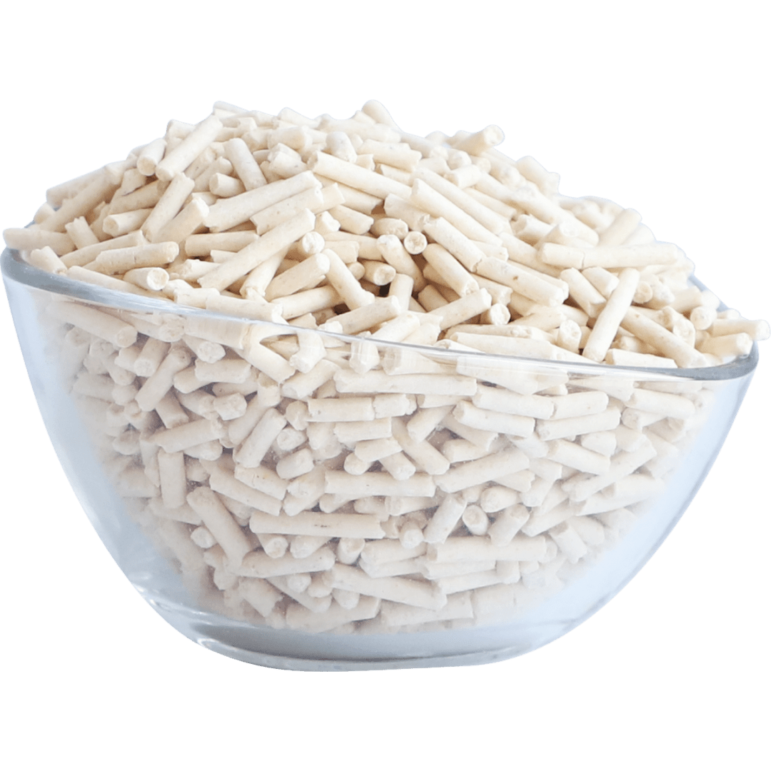 White soya clumping cat litter pellets in a clear bowl