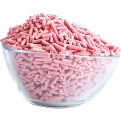 Pink soya clumping cat litter pellets in a clear bowl