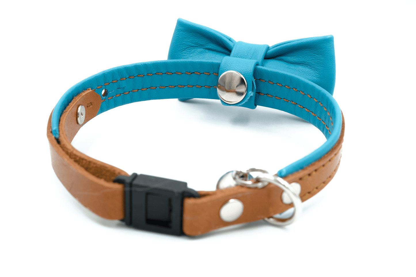 Blue leather cat collar with bow, silver bell, and black plastic clasp