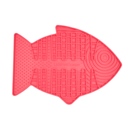 Pink fish-shaped slow feeder mat with raised lick channels and circular swirl