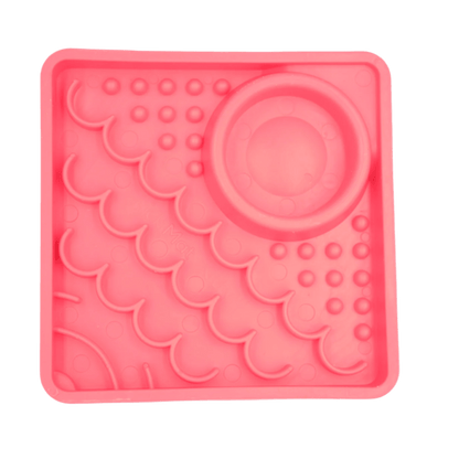 LickiMat® Kitty slow feeder for kittens in pink, with raised lick nubs and circular dish