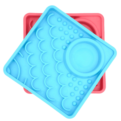 LickiMat® Kitty slow feeder set: blue tray over pink tray with raised lick nubs and dish