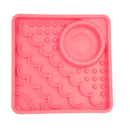 LickiMat® Kitty slow feeder for kittens in pink, with raised lick nubs and circular dish