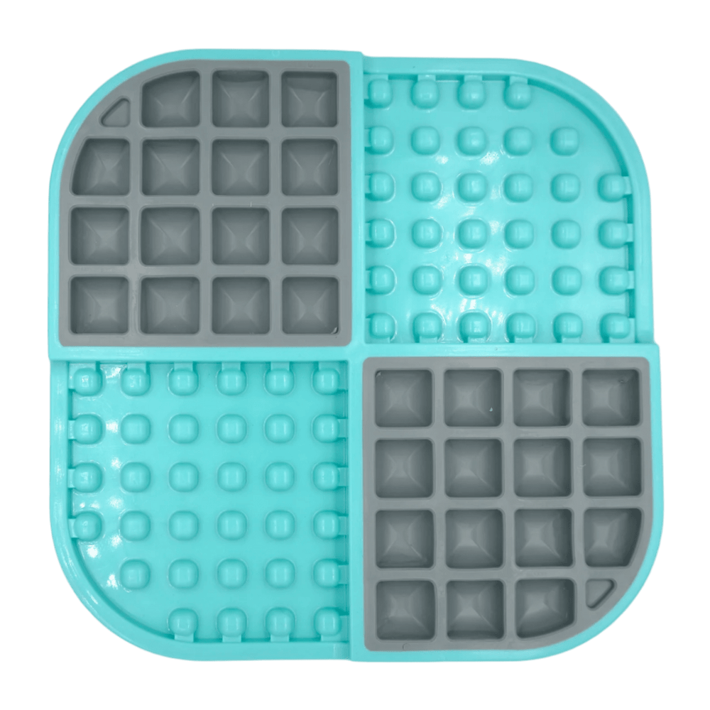 Slow feeder cat feeding mat with turquoise silicone and gray puzzle sections