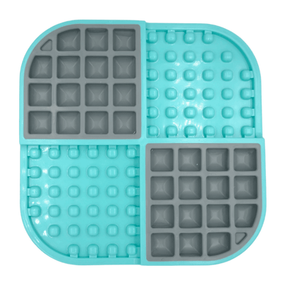 Slow feeder cat feeding mat with turquoise silicone and gray puzzle sections