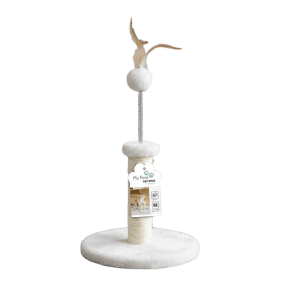 White kitten cat scratching tree with circular base and dangling pom ball and feather