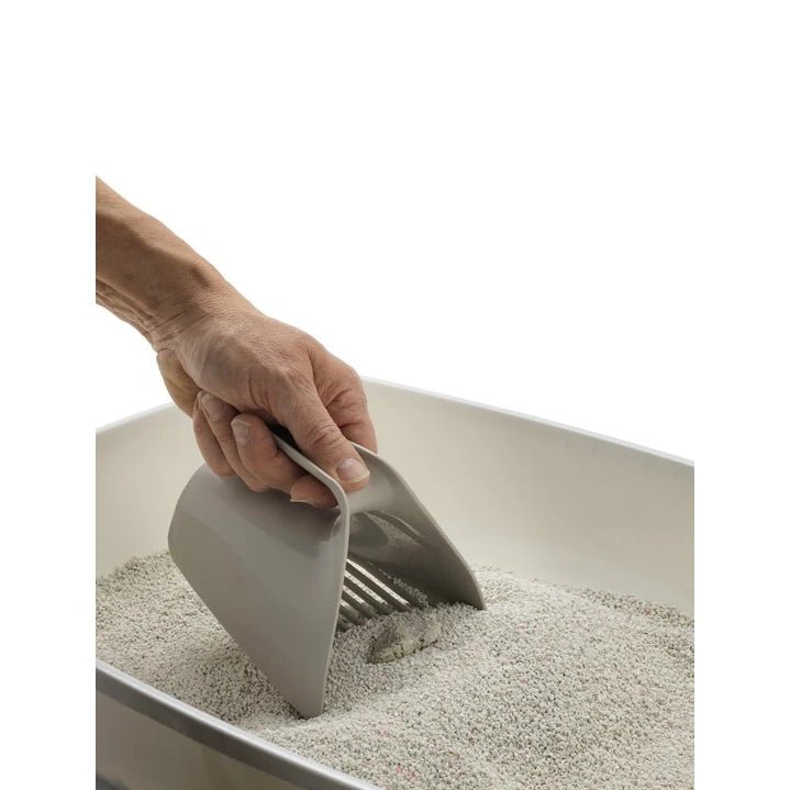 Moderna Scoop & Sift Cat Litter Scoop — warm-grey scoop lifting litter
