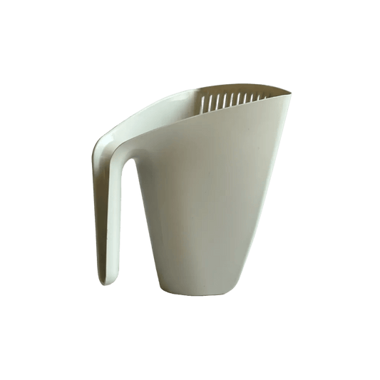 Light beige cat litter scoop with wide bowl and ridged sifting slots