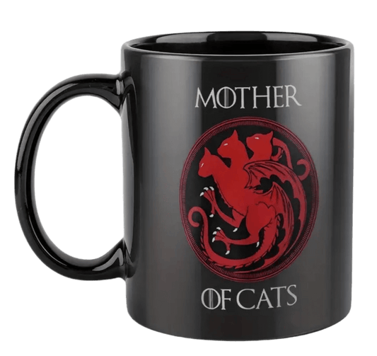 Black ceramic mug with handle, red cat logo, and 'MOTHER OF CATS' lettering