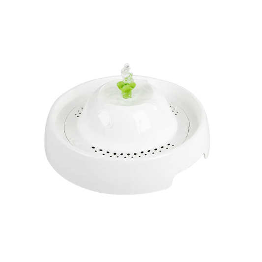White pet water fountain with round base and green water spout
