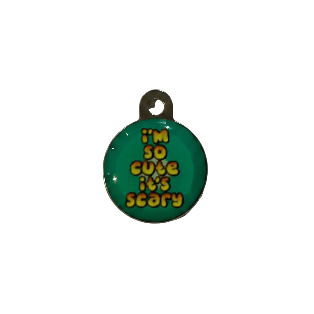 Round cat ID tag, green enamel with 'I'm so cute it's scary' text