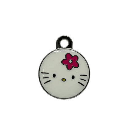 Round cat ID tag, white enamel with cartoon cat face and red bow
