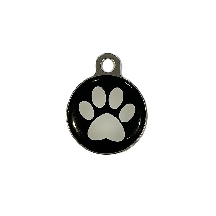 Round metal cat ID tag with large paw print design in black and gray.