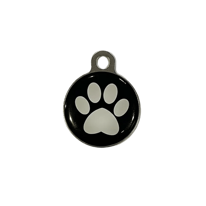 Round metal cat ID tag with large paw print design in black and gray.
