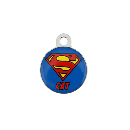 Round metal cat ID tag with Superman-style emblem and 'CAT' text on blue.