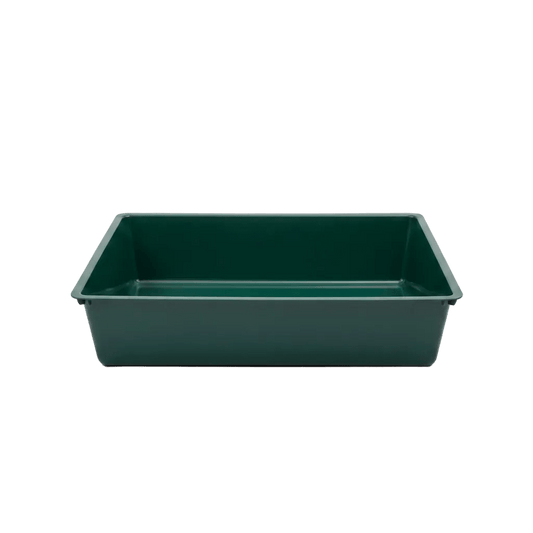 Green plastic cat litter tray, rectangular with open top