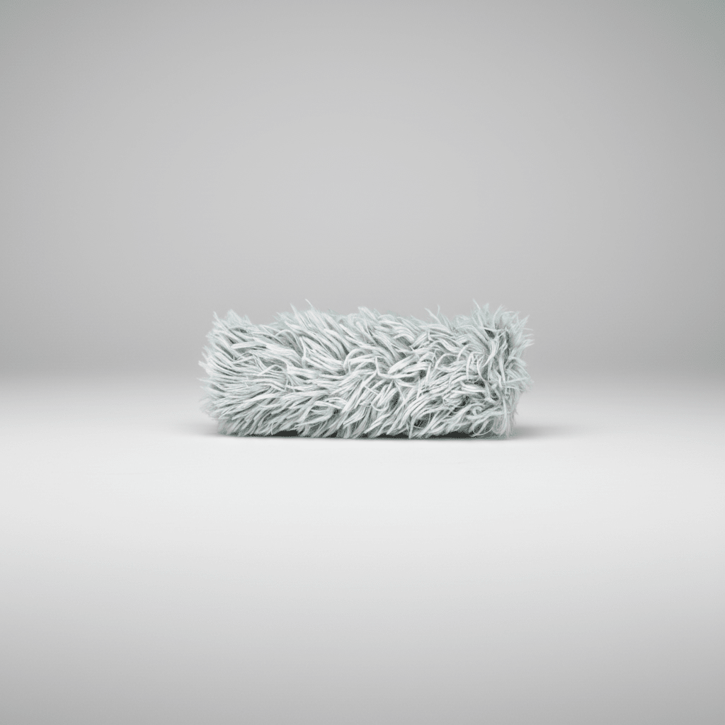 Gray plush cat kicker toy shaped like a short fuzzy wand.
