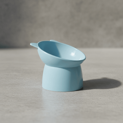 Raised cat feeding bowl in light blue, side view of wide dish