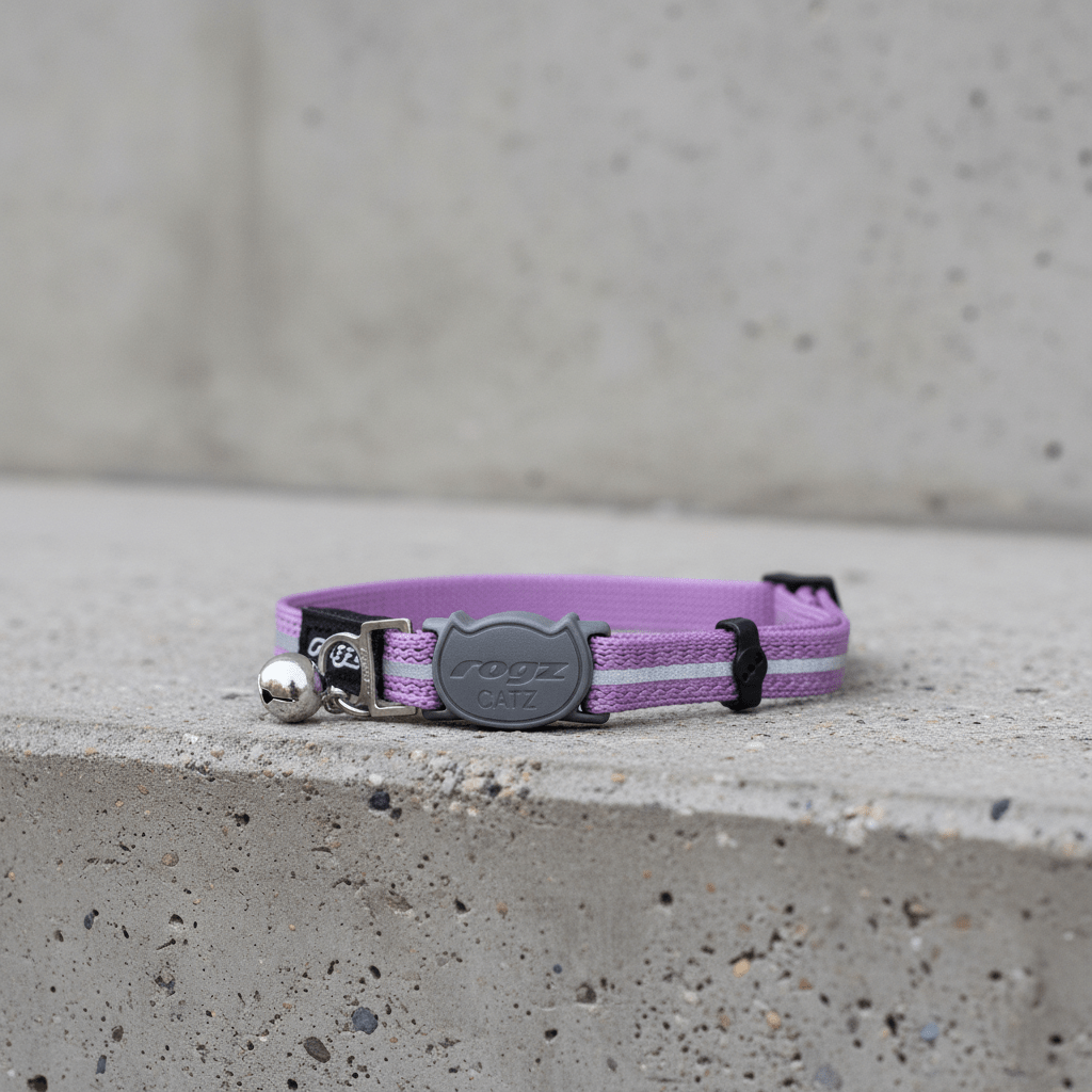 Lilac reflective breakaway cat collar with engraved logo and bell tag
