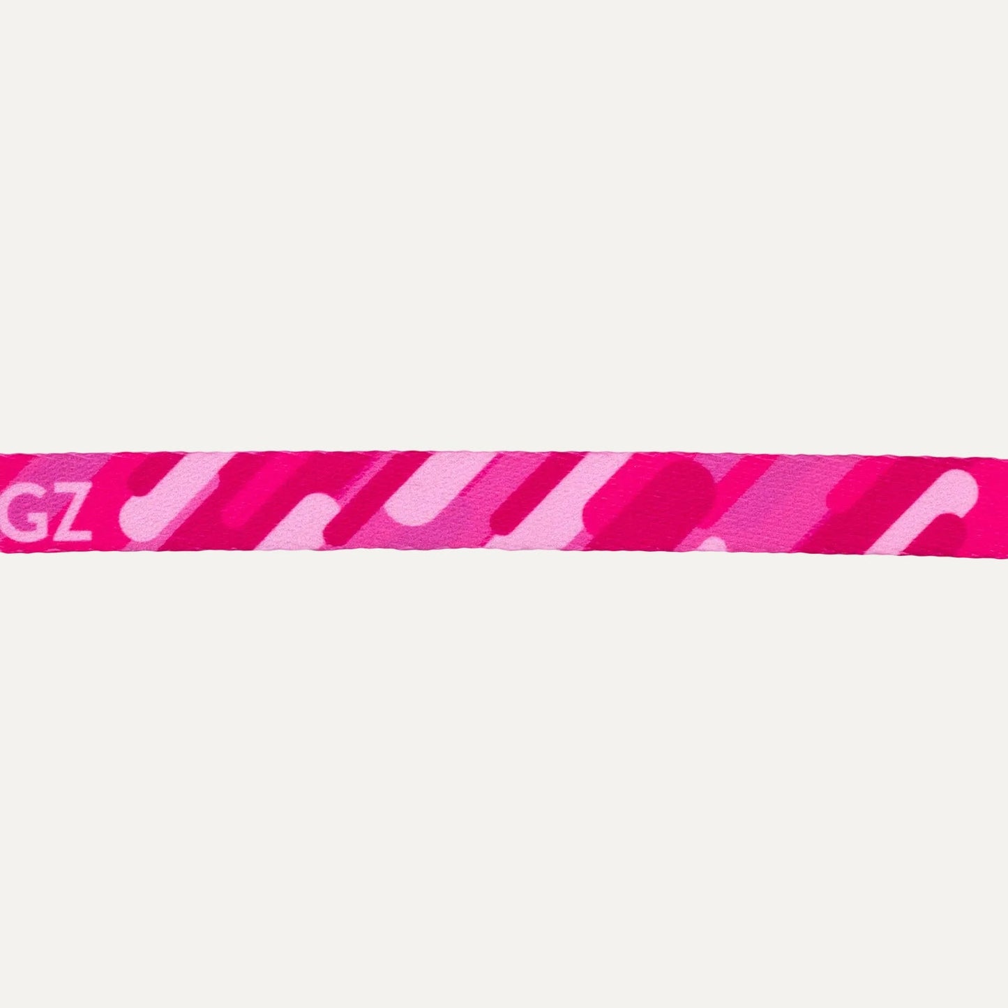 Pink patterned cat safety collar with Rogz text and gray buckle clasp