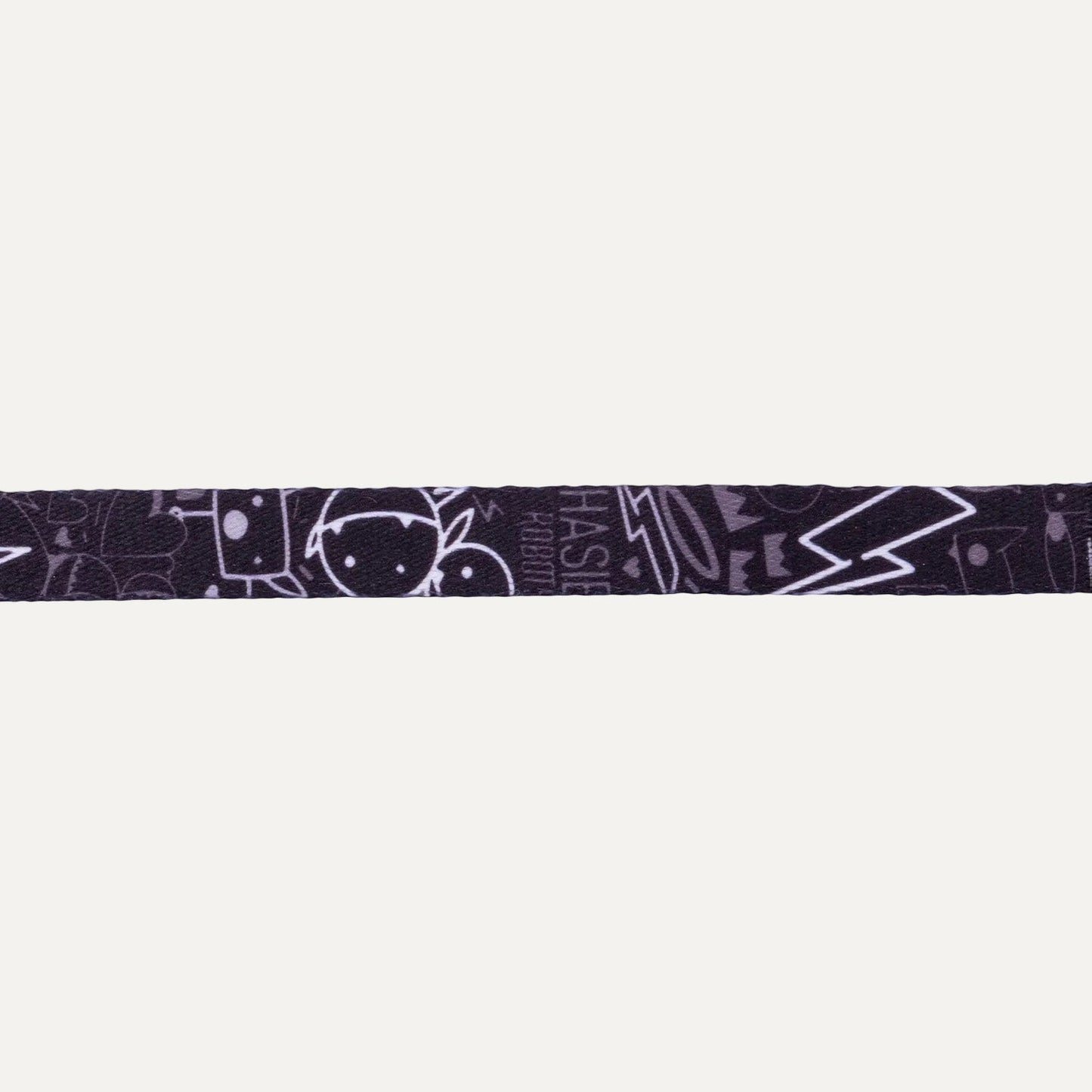 Dark patterned cat safety collar band with Rogz-style markings and clasp