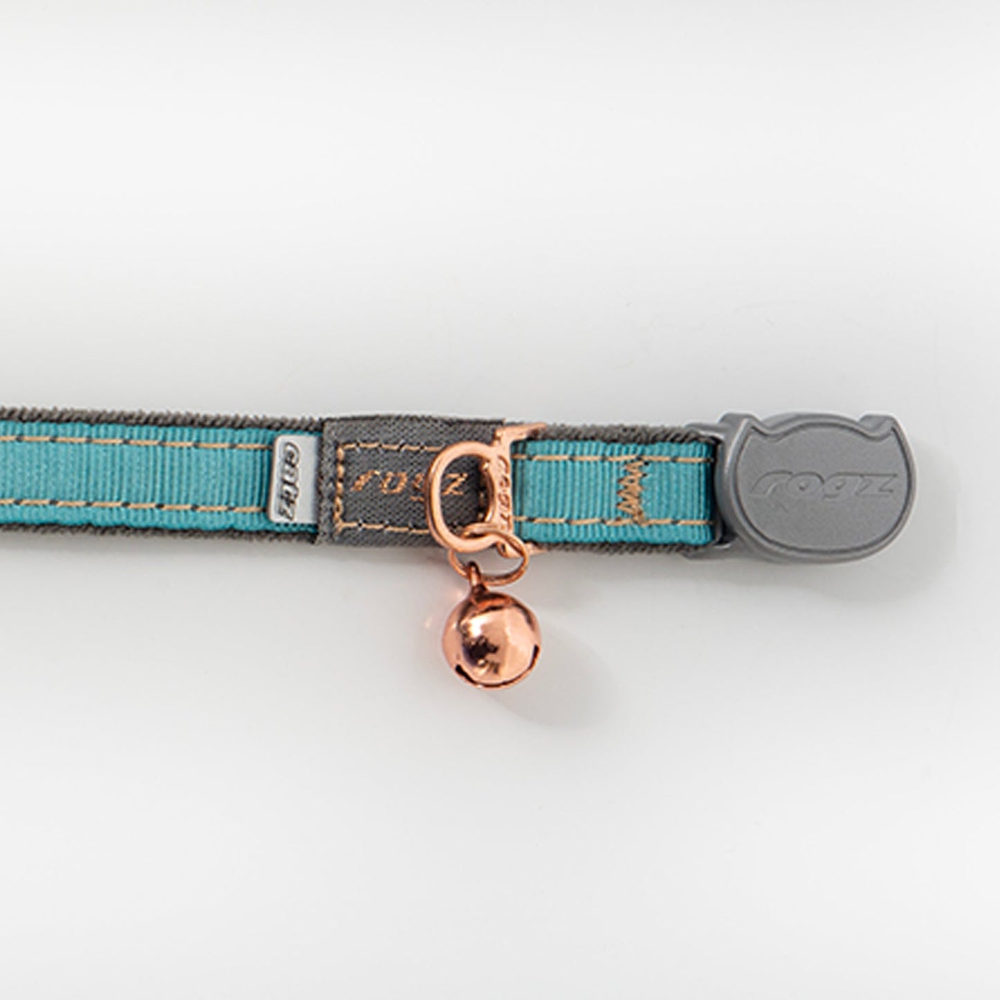 Turquoise webbing cat collar close-up with rose-gold bell and rogz clasp