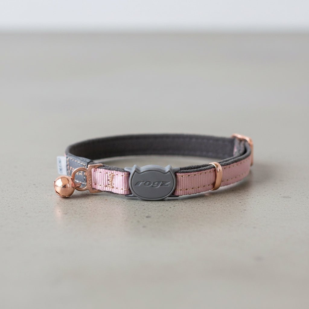 Pink cat safety collar with bell and adjustable fabric strap, rogz buckle
