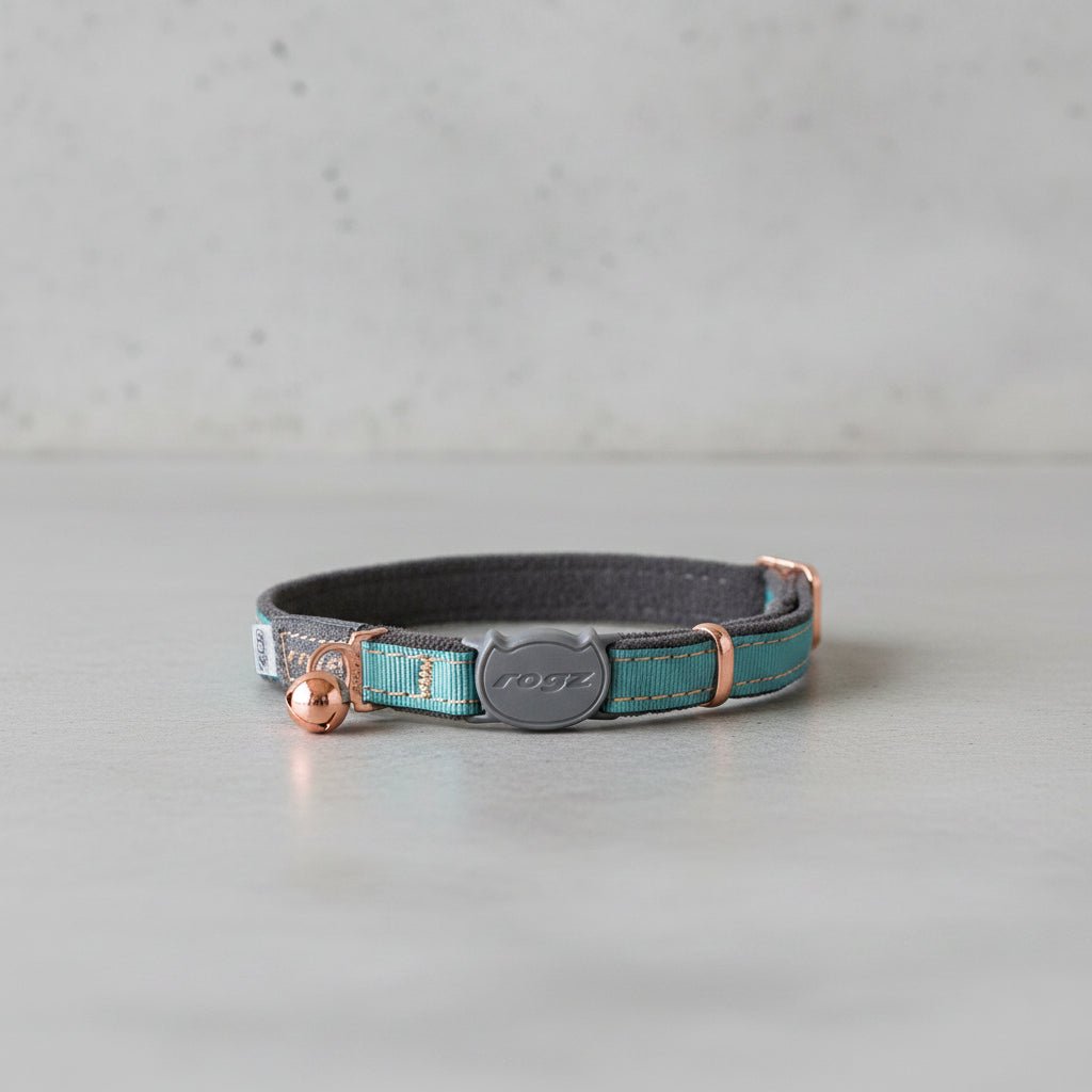 Turquoise cat safety collar with bell and adjustable strap, rogz buckle