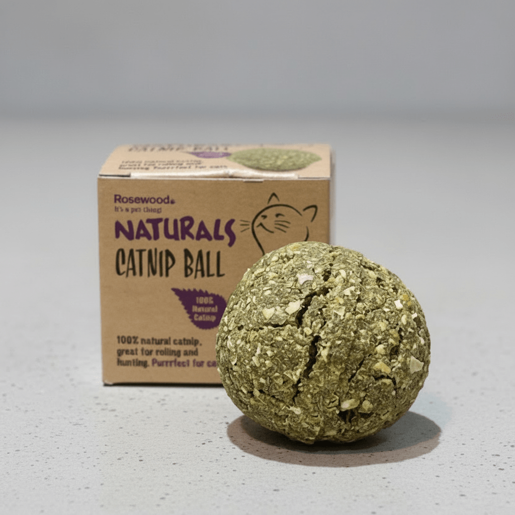 Green textured catnip ball with Rosewood Naturals box, front view.