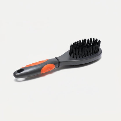 Cat brush head with black bristles on gray handle with orange accent