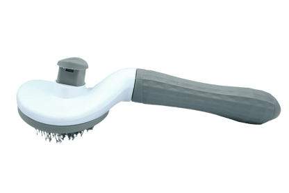 Self-cleaning cat grooming brush with gray bristle pad and dark handle
