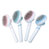 Self-cleaning pet grooming brush set with silicone bristles and white handles