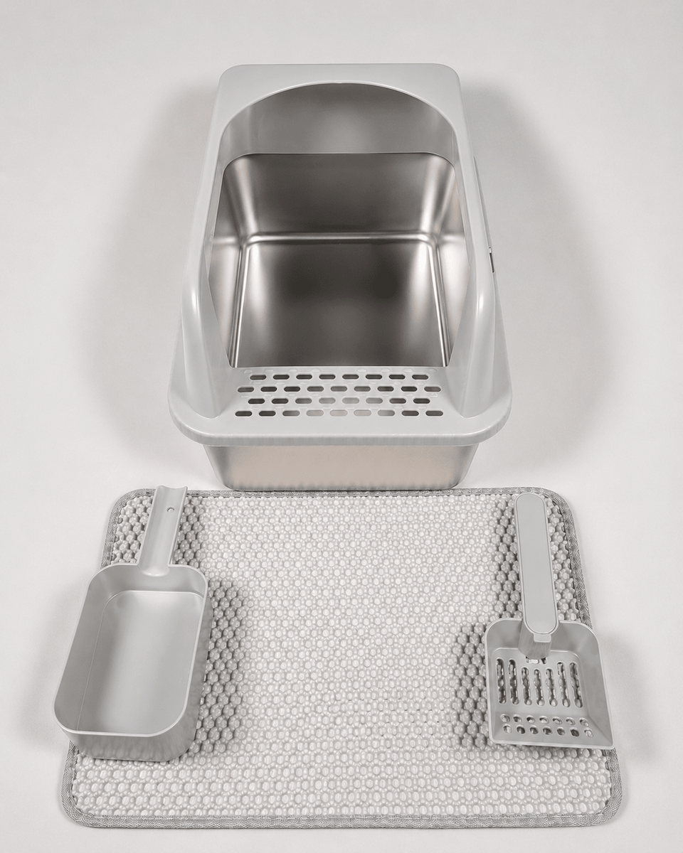 White high-wall cat litter box with scoop and textured anti-slip mat