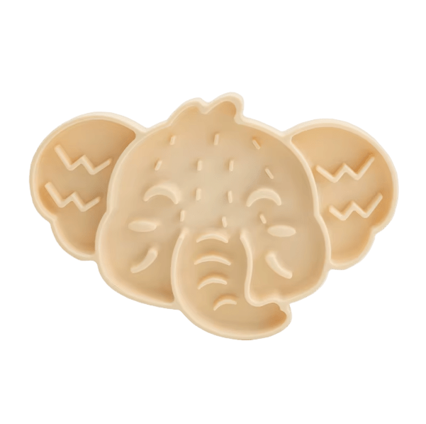 Elephant-shaped silicone slow feeder mat for cat bowls, tan with raised feeding grooves