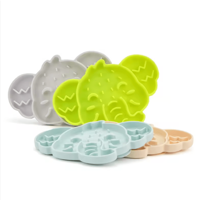 Elephant silicone slow feeder mat set in gray, neon green, and pale tan with raised texture