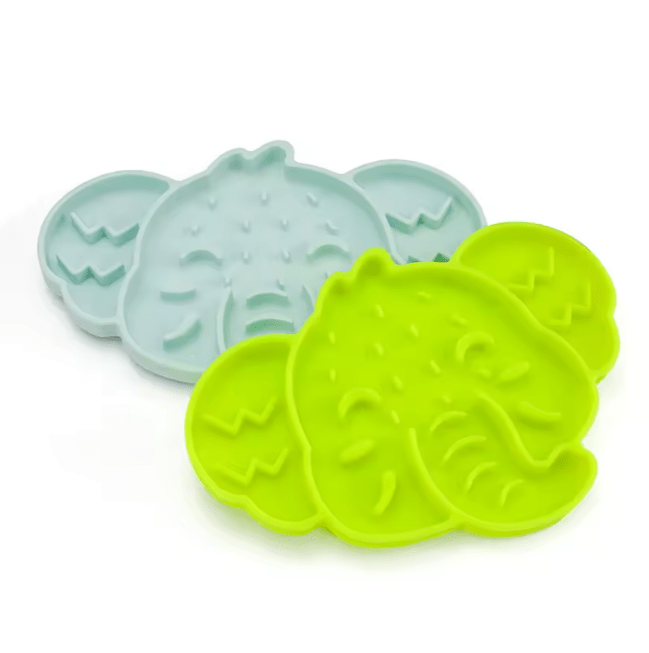 Elephant silicone slow feeder mat in neon green and pale aqua with raised bump texture