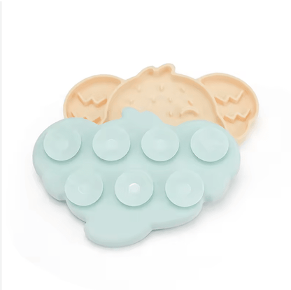 Elephant silicone slow feeder mat in light blue with raised round treat cups on top