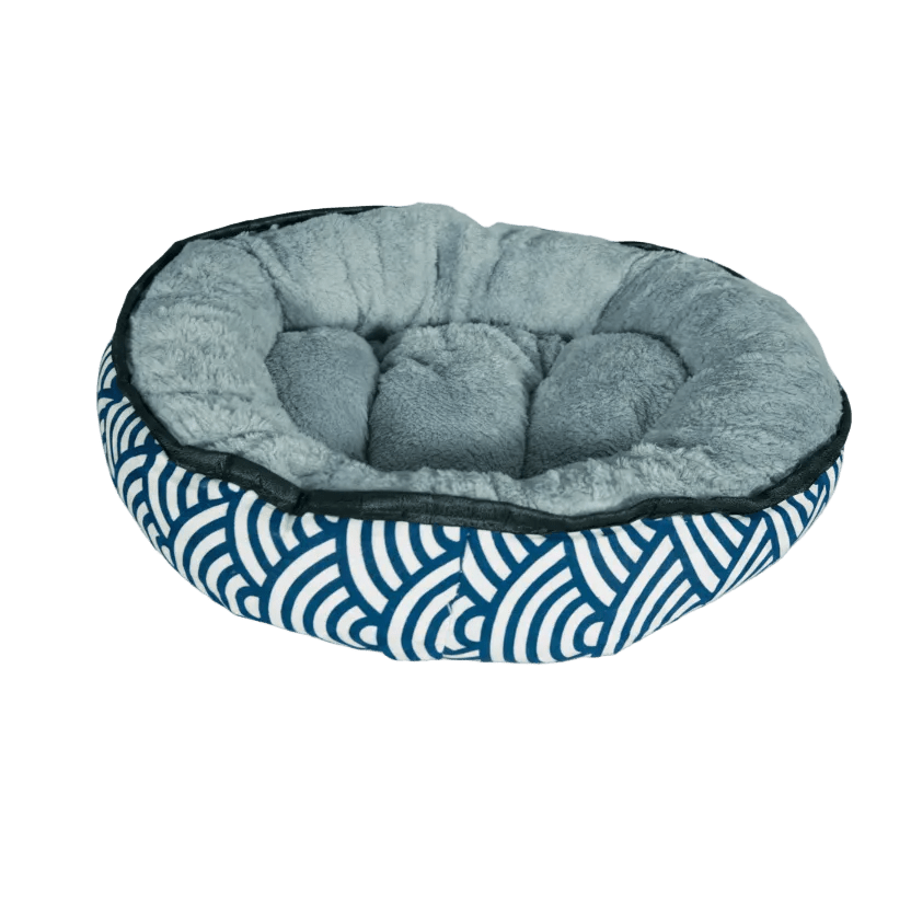 Reversible plush oval kitten bed, light gray inner cushion and blue striped wave exterior