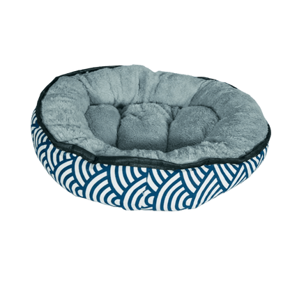Reversible plush oval kitten bed, light gray inner cushion and blue striped wave exterior