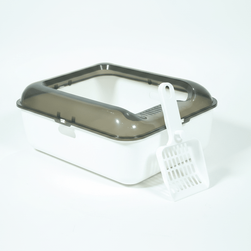 White cat litter box with dark gray lid, scoop on front