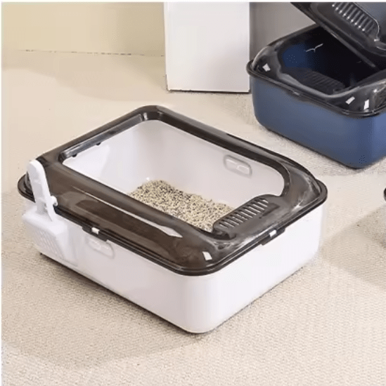 White cat litter box with open top and litter-filled tray