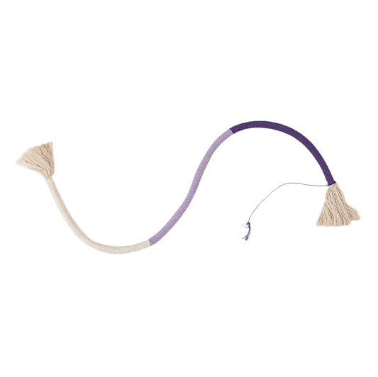 Cat chew toy with purple rope and beige tassel ends